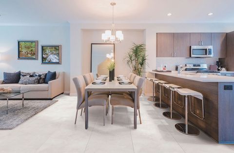 Modern Living Space With Dining And Open Concept Kitchen. Floor Tiles ... with regard to Balancing aesthetics and practicality when selecting a dining table for open concept living